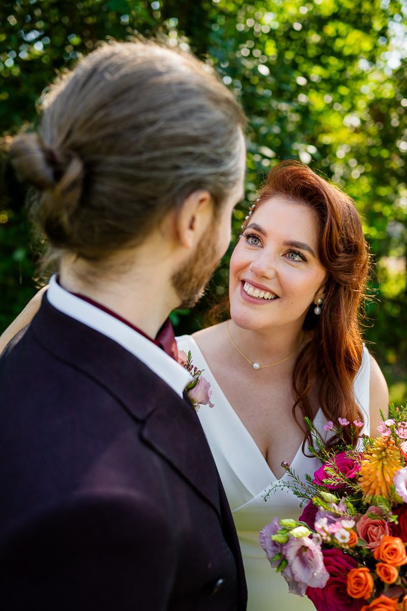 Bride looking at the groom during their wedding at Drumhierny Woodland Hideaway, Sligo