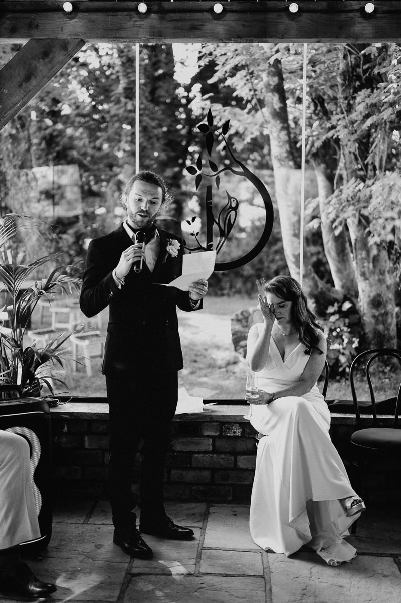 Groom giving a wedding speech at Drumhierny Woodland Hideaway, Leitrim