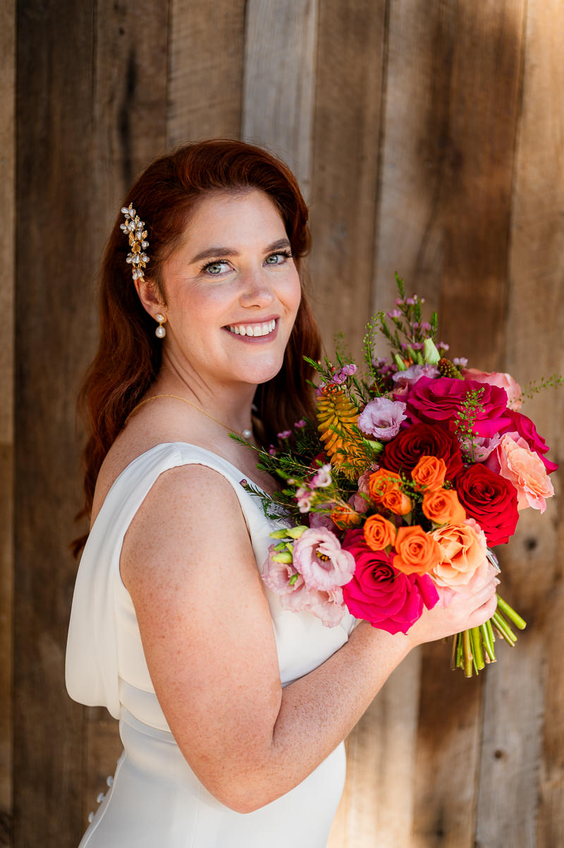 wedding portrait of bride with flowers at drumhierny woodland hideaway